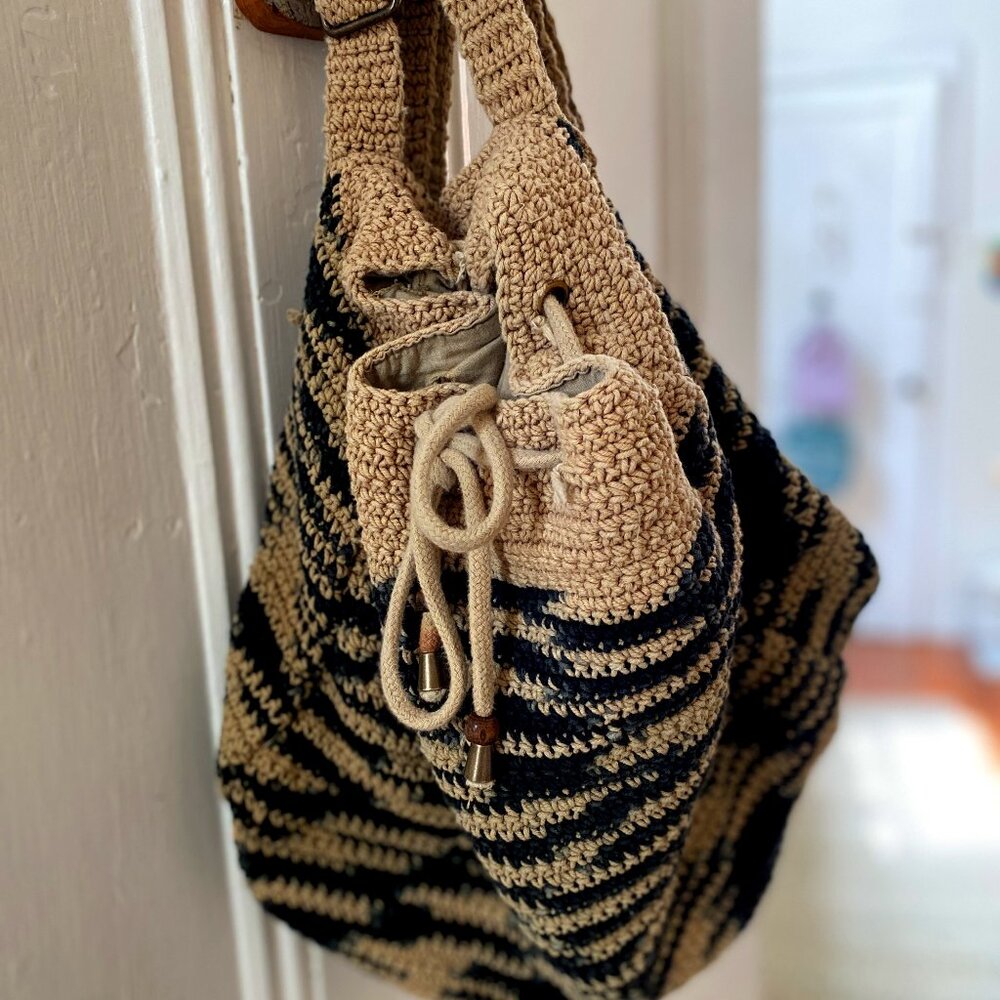 Free People Montana Crochet Backpack in tan/black